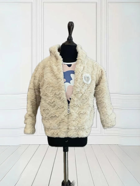  It is a smart Cream Colored winter Jacket for baby girls that comes with a small patch detailing on it.