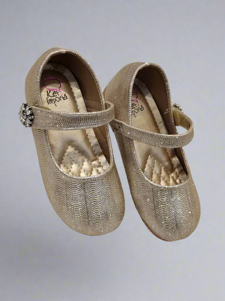 Elegant girls' gold ballerina shoes featuring a glittery finish and decorative strap, Jaipur