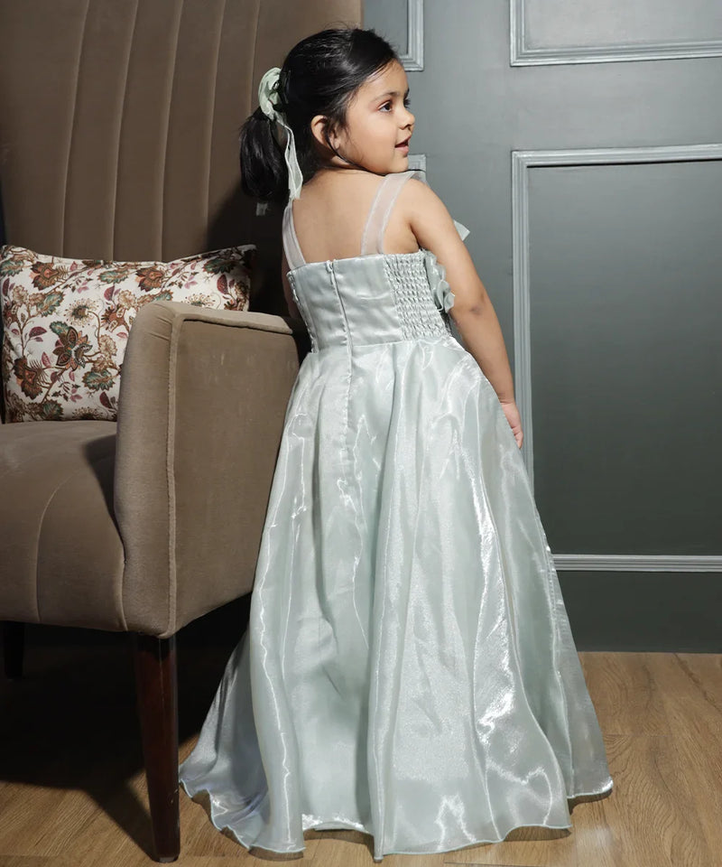 back view of pista green long gown for girls 