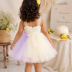 Full A-line flare of lavender and ivory princess-style baby girl frock