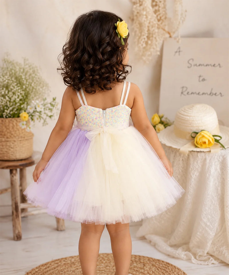 Full A-line flare of lavender and ivory princess-style baby girl frock