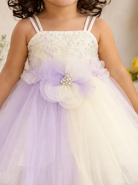 Close-up of baby girls' frock pearl flower appliqué