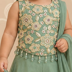 Round neck and sleeveless design on green girls wedding sharara top