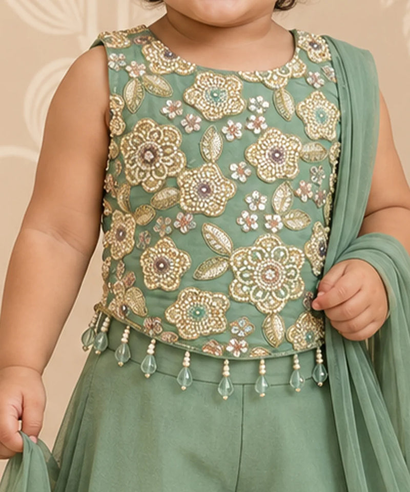 Round neck and sleeveless design on green girls wedding sharara top