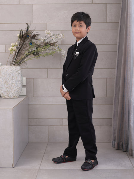 side view of black coat suit set for boys