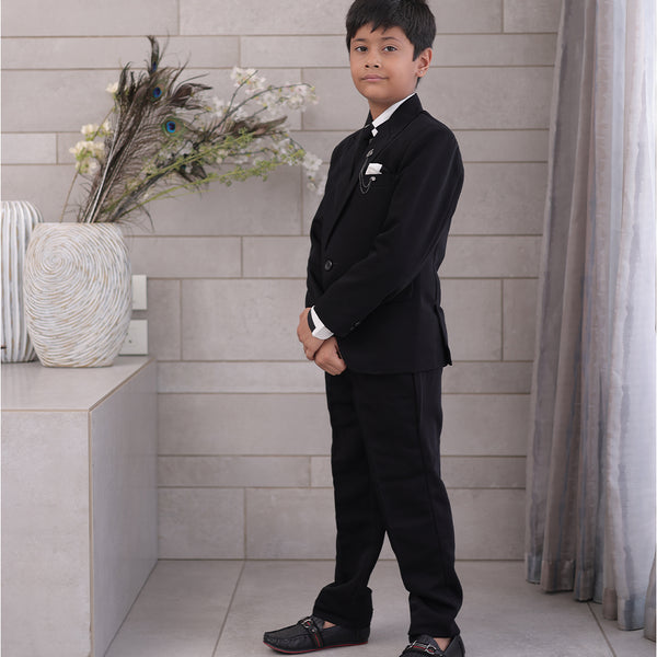 side view of black coat suit set for boys