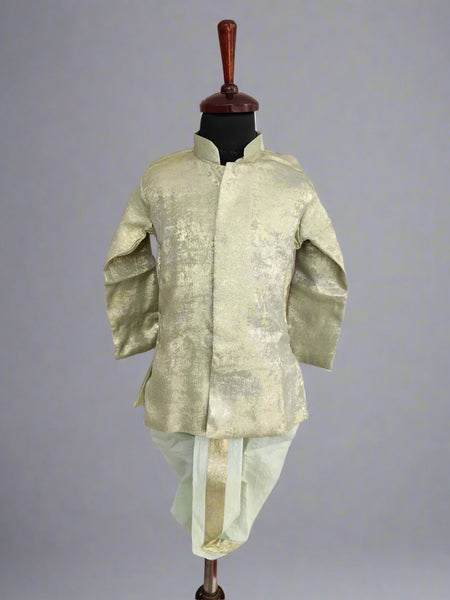 A green shimmering color dhoti set for infants displayed on a mannequin.