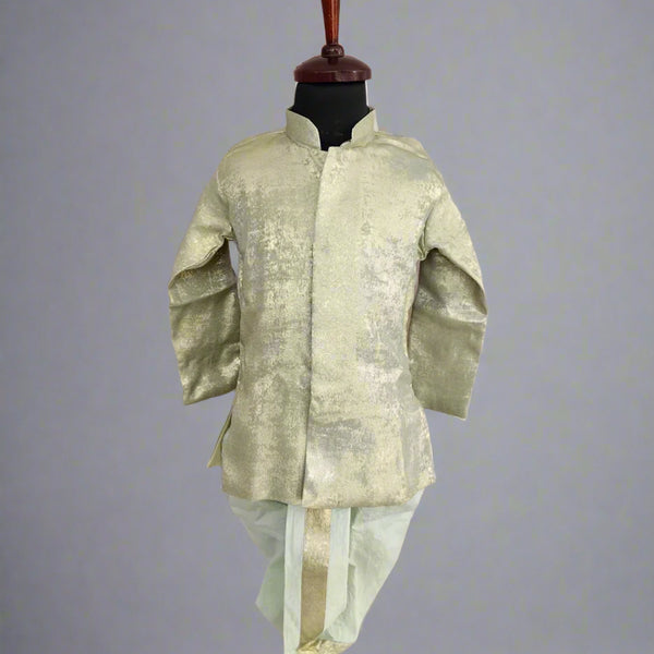 A green shimmering color dhoti set for infants displayed on a mannequin.