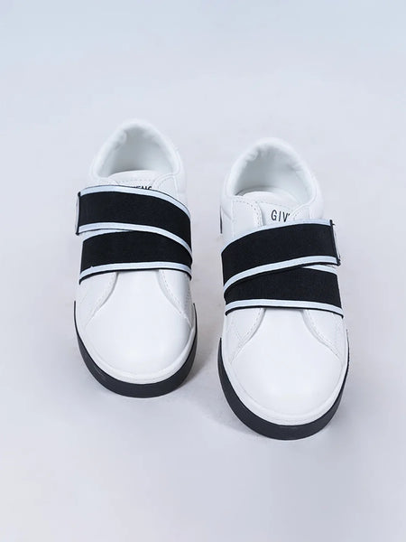 Kids' modern white and black sneakers featuring bold straps and cushioned sole, Jaipur