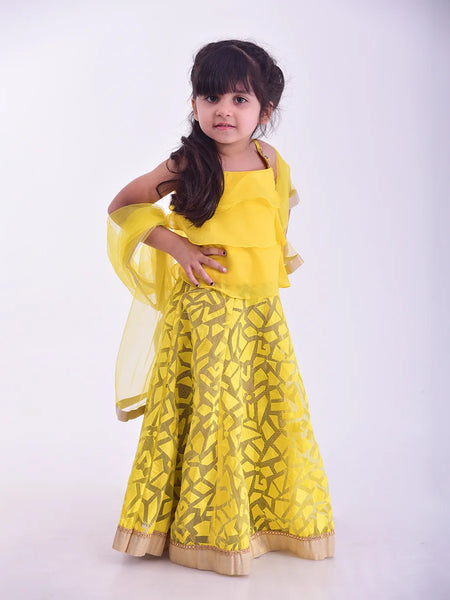 Best yellow lehenga for kids wedding in Jaipur, layered choli and gold lace accents