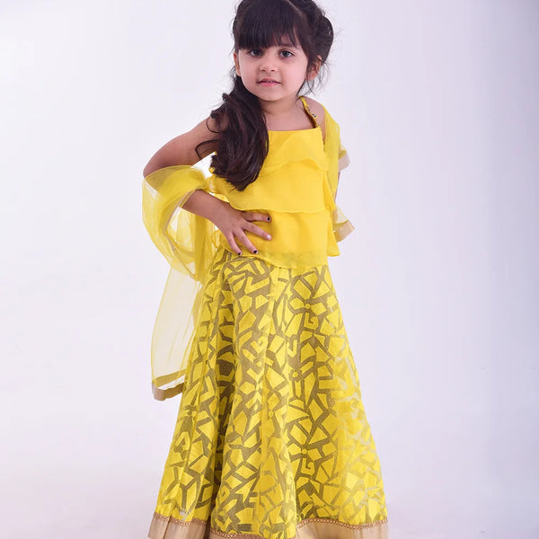 Best yellow lehenga for kids wedding in Jaipur, layered choli and gold lace accents