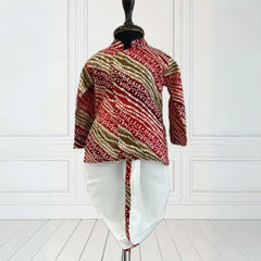 It is a multi-coloured Bhandej print boys' kurta set with a matching white dhoti. Dhoti comes with an elasticated waist and a tie-string belt.