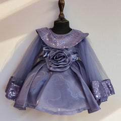 Lavender dress with sequin details on a mannequin against a white background