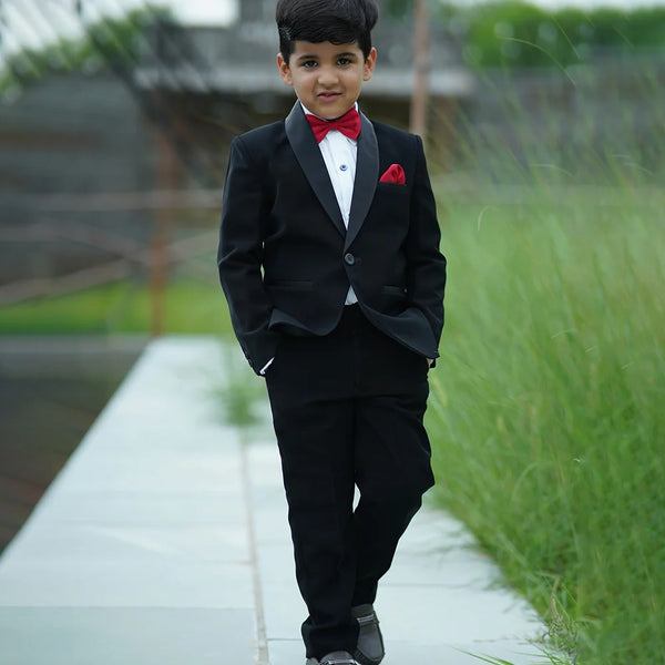 An elegant Suit set that comes with a black coat, white shirt and black pants perfect for every formal occasion. This top-line quality suit set is paired with a beautiful red Colored bow and a pocket square.