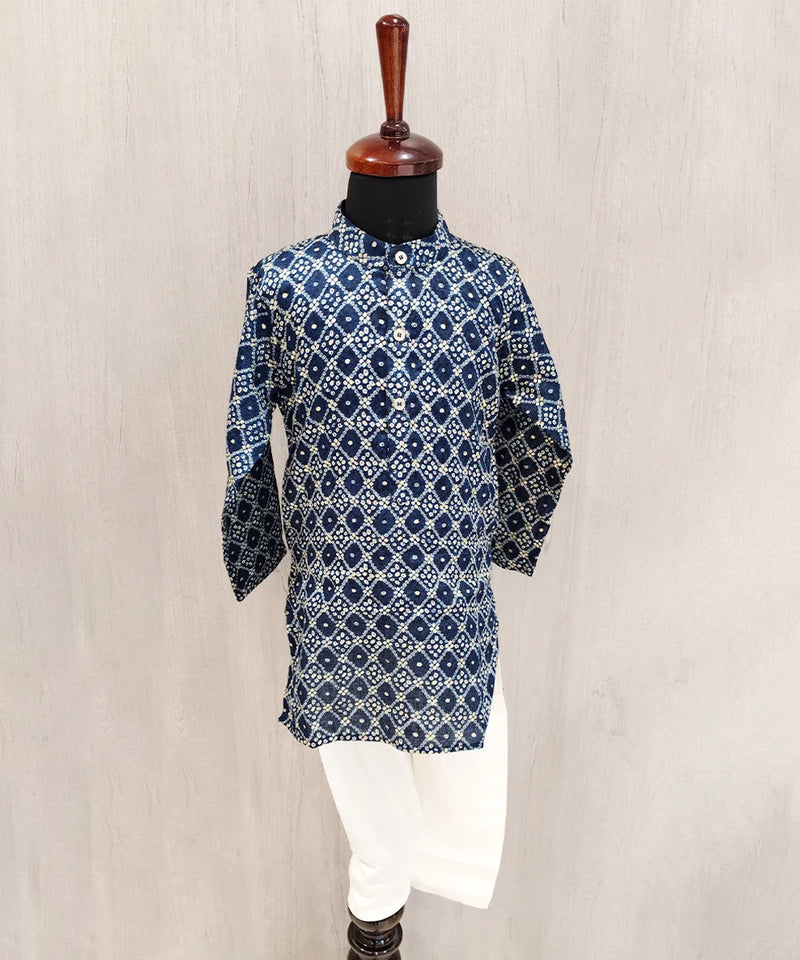 Blue patterned kurta on a mannequin against a beige background