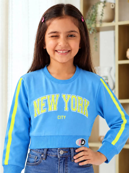 Girls' blue New York print full sleeve crop top, front view, by Devils N Angels Jaipur