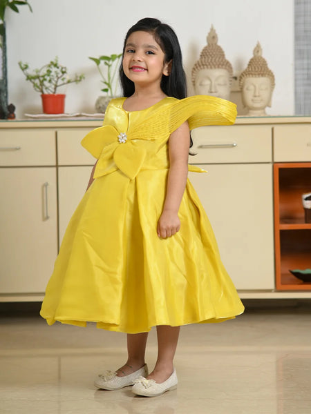 Designer neon yellow party frock for girls with floral detail, best children’s wear shop Jaipur