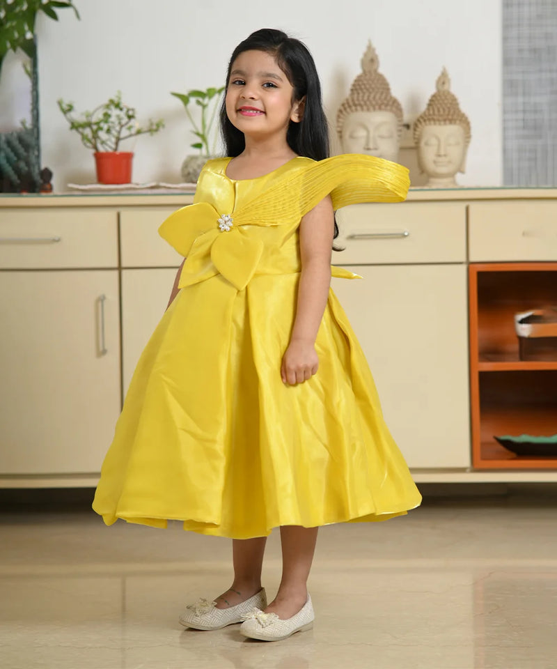 Designer neon yellow party frock for girls with floral detail, best children’s wear shop Jaipur