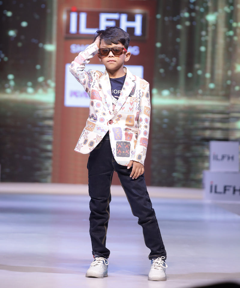  This smart outfit consists of a self-printed Blazer, a matching self-printed black Colored t-shirt and a pocket square.