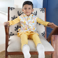 It is a Yellow-Colored kurta pyjama set teamed up with a matching waistcoat perfect for wedding functions.