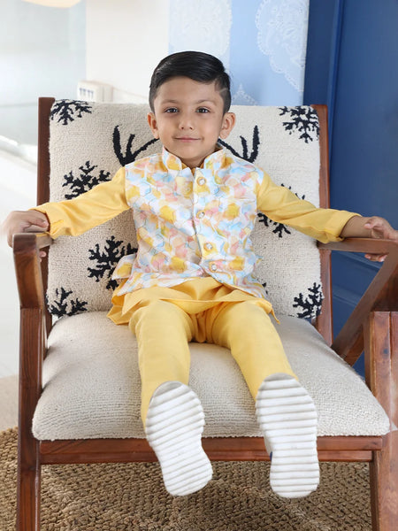 It is a Yellow-Colored kurta pyjama set teamed up with a matching waistcoat perfect for wedding functions.