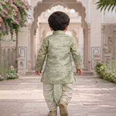 Child in a traditional outfit walking away in an ornate courtyard