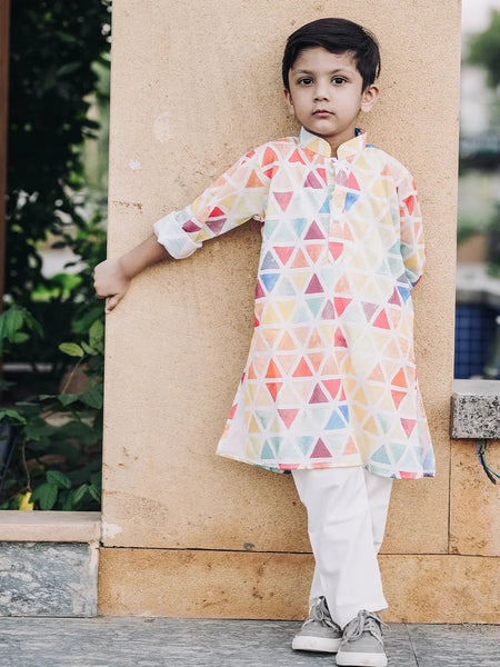 It is a multi colored printed kurta teamed up with a matching pyjama, that can be creatively styled with ethnic shoes and is the best boy's designer kurta-pyjama set.