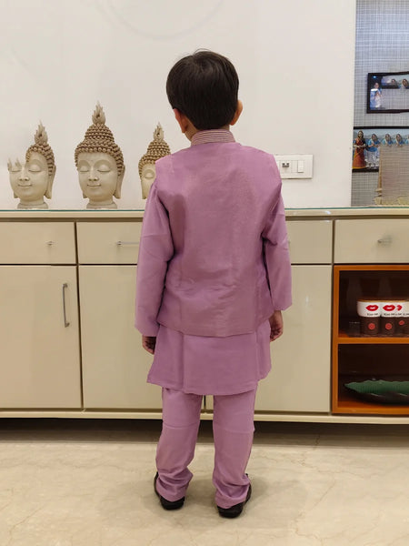 The is back look of lavender color kurta pajama with jacket. The jacket is plain from behind.