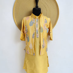 Yellow outfit with floral patterns on a mannequin against a white background