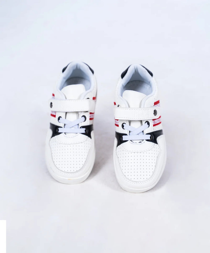 Kids' trendy white and black sneakers for boys featuring double closure and stylish red bands, Jaipur