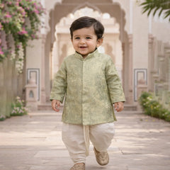 Child wearing a traditional outfit in an outdoor setting with architectural elements.