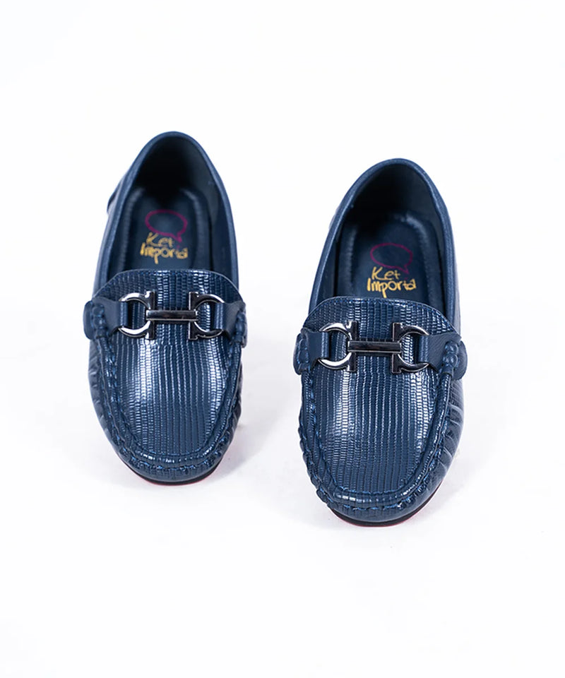 Boys' trendy navy moccasins featuring embossed finish, metal buckle, and red outsole, Jaipur

