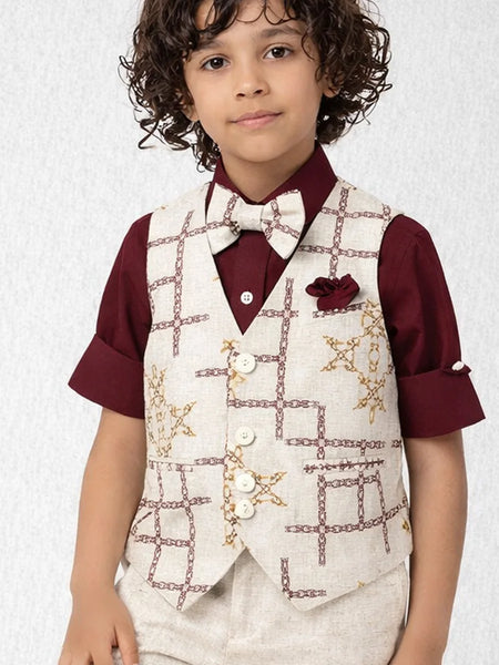Child wearing a maroon shirt with a white vest and bow tie against a light background