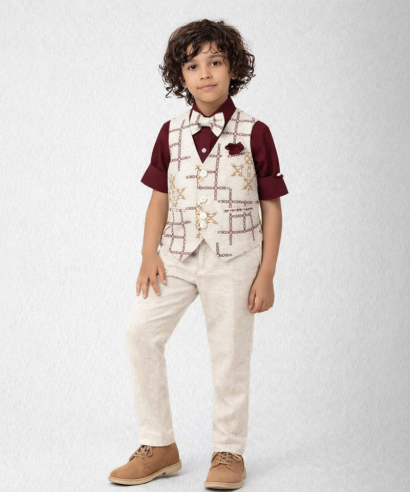 Child wearing a formal outfit with a vest, shirt, and pants on a light gray background