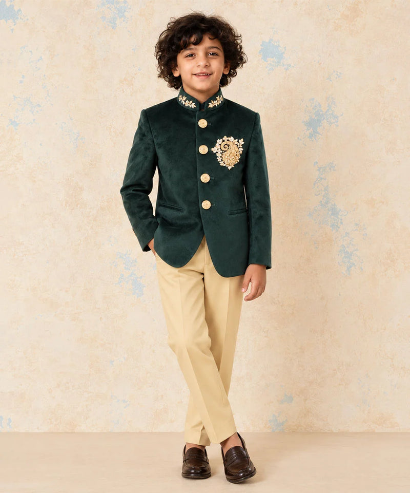 Boys' green velvet Jodhpuri suit for weddings and parties by Devils N Angels Jaipur