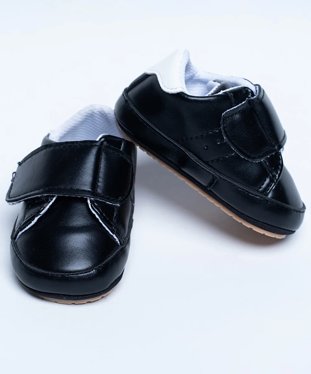 It's a pair of black Colored shoes perfect for evening gatherings.