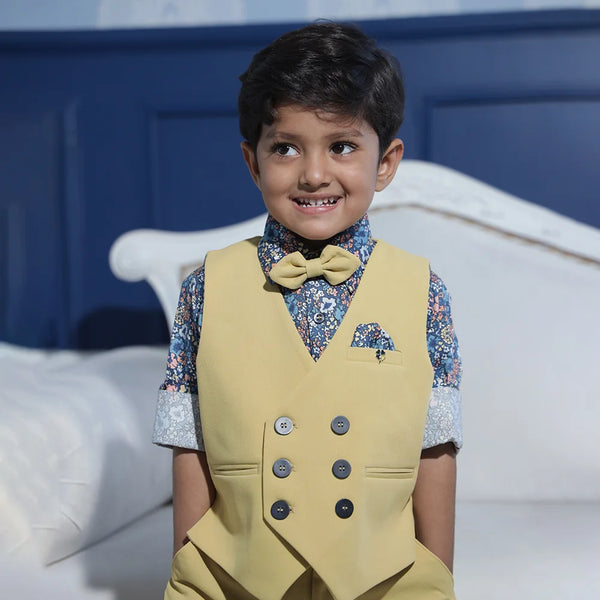 blue printed shirt with beige waist coat and a bow paired with beige pants for boys for parties & wedding