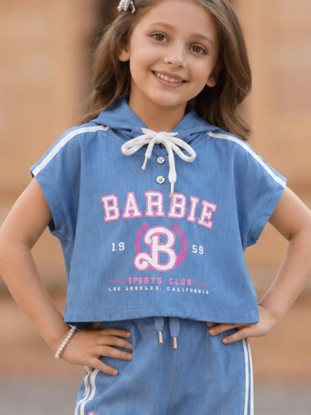 Young girl wearing a blue Barbie sports club outfit with a hood.