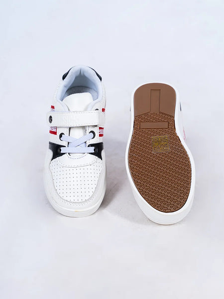 Close-up of boys' fashion sneakers with perforated upper and bold designer straps, Jaipur