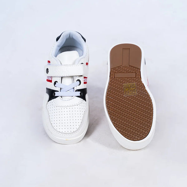 Close-up of boys' fashion sneakers with perforated upper and bold designer straps, Jaipur