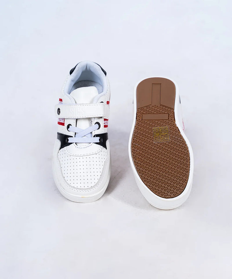 Close-up of boys' fashion sneakers with perforated upper and bold designer straps, Jaipur