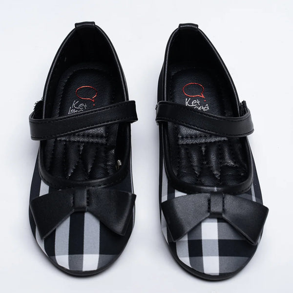 Black and white checkered girls' ballerina flats with black bow and strap, Jaipur, ages 1–8 years
