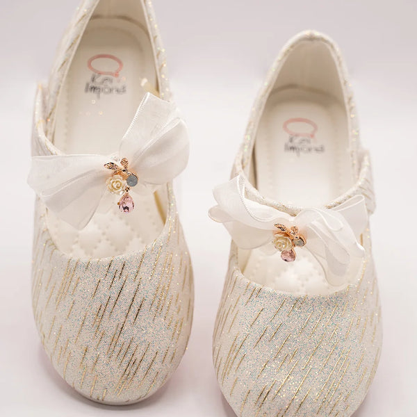 Infant girls’ ivory glitter party shoes with organza bow and floral embellishment, Jaipur

