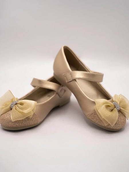 Kids' gold dress shoes for girls featuring a decorative bow and Velcro strap, Jaipur