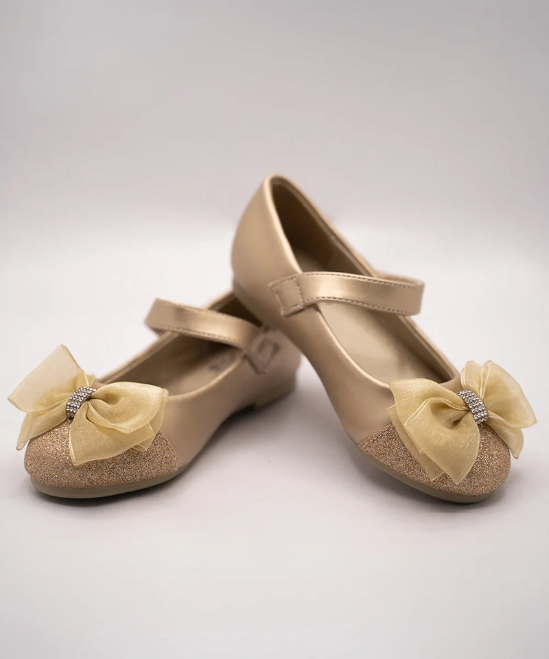 Kids' gold dress shoes for girls featuring a decorative bow and Velcro strap, Jaipur
