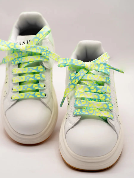 Kids' white lace-up shoes for girls featuring happy face graphics and bright neon accents, Jaipur