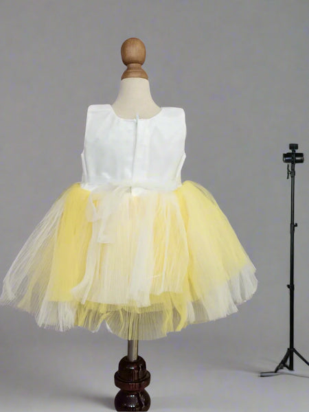 back view of white yellow frock for baby girls 