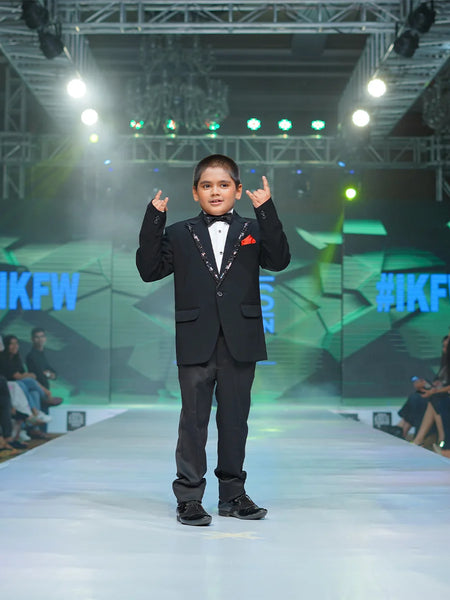 Elegant sequin lapel boys tuxedo with red pocket square Jaipur