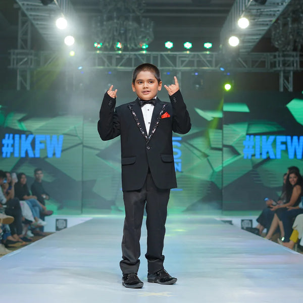 Elegant sequin lapel boys tuxedo with red pocket square Jaipur