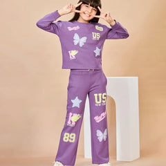 Child wearing a purple outfit with graphics on a beige background
